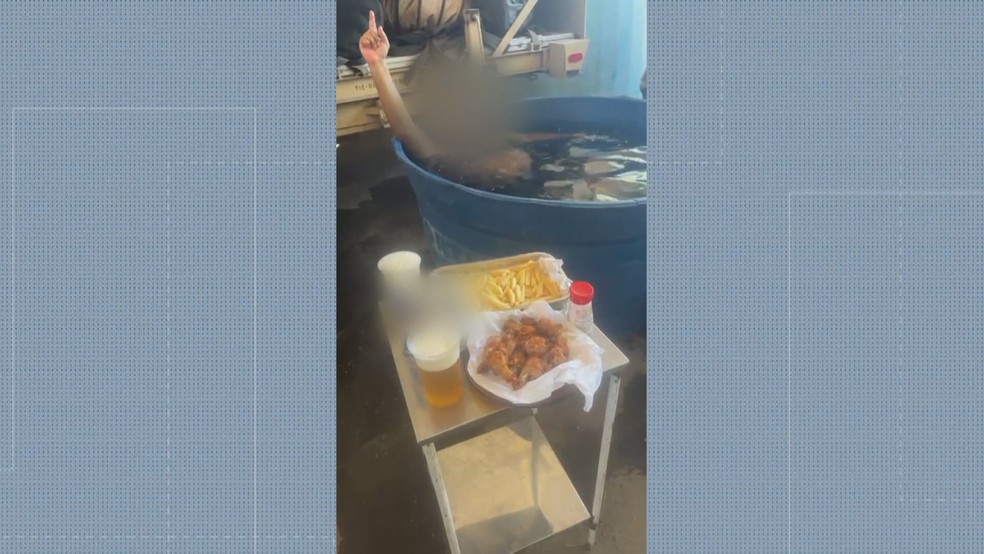 Funcionários são flagrados fazendo festa no antigo Hospital de Campanha de Nova Iguaçu — Foto: Reprodução / TV Globo